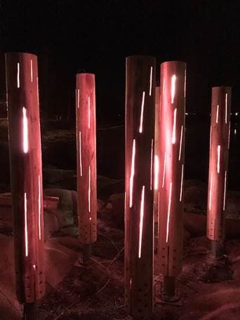 Lysende tømmerstokker